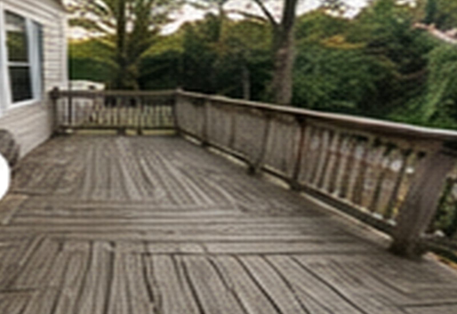 Weathered deck before restoration